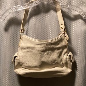 Woman’s white purse